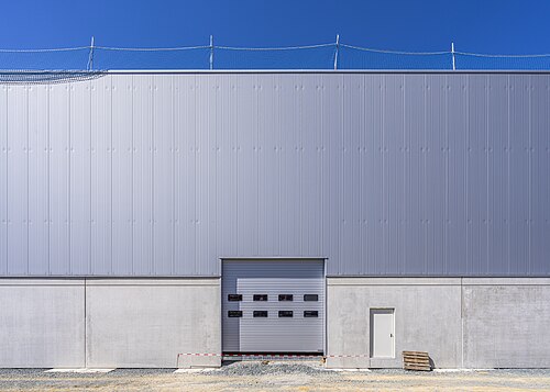 Gate and broad facade at an industrial park in Hofer Land, Bavaria, Germany